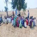 People gathered in a distressed area